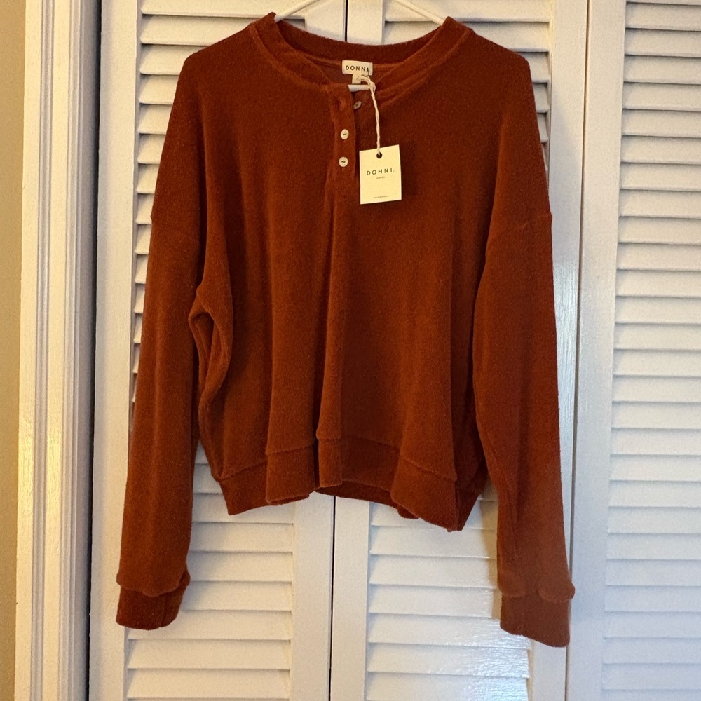 DONNI. Henley  Sweater in Warm Rust